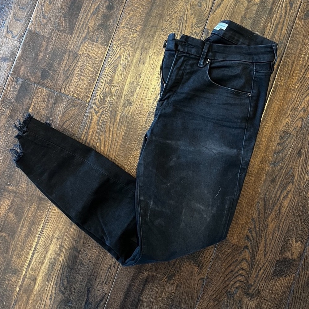 good american dark grey skinny jeans with distressed hem